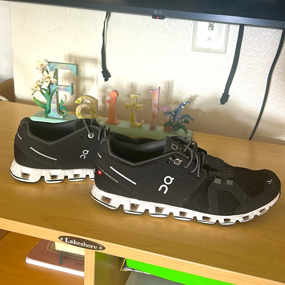 On Running Black and White Athletic Shoes with CloudTec Sole